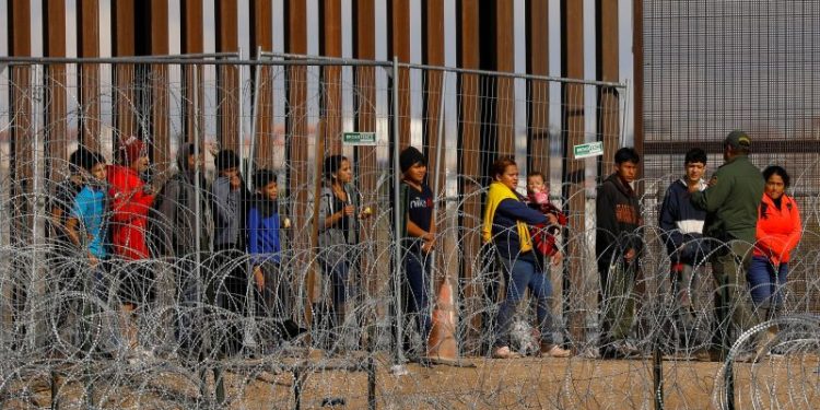 Biden vows to ‘shut down’ an overwhelmed border if Senate deal passes