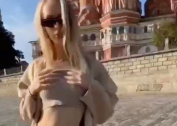 Russian government hunting Ukrainian OnlyFans model who posed topless in front of church