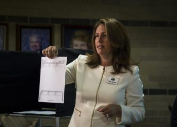 Man pleads guilty to threatening Michigan official over 2020 election