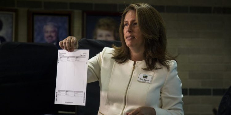 Man pleads guilty to threatening Michigan official over 2020 election