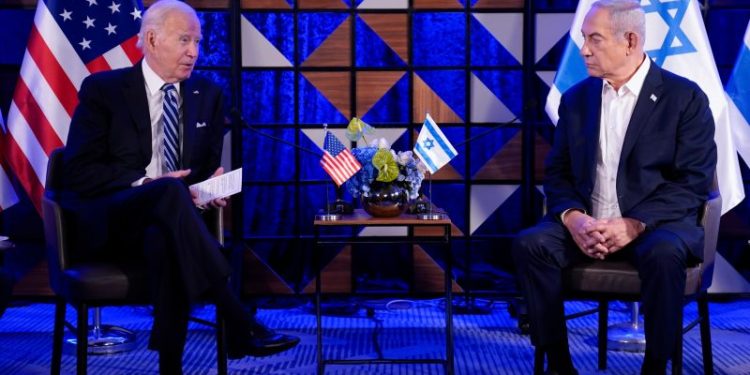 Biden says countries receiving U.S. weapons must adhere to international law