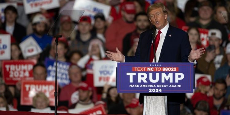 Trump deflects anti-democracy criticism; accuses Biden, without evidence, of conspiring against U.S.