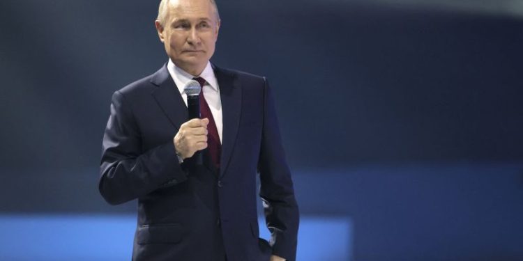 Putin set to sweep to fifth term as Russians head to polls