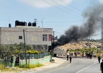 Hundreds of Israeli settlers attack Palestinian villages in the occupied West Bank after missing Israeli boy found dead