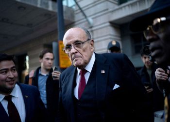 Giuliani says he will stop accusing Georgia workers of election tampering
