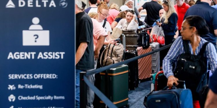 Delta Airlines cancellations and delays continue but worst of IT outage impact is over, CEO says
