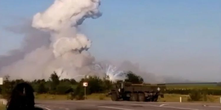 Russia vows to respond after Ukrainian drone attack sets on fire alleged munitions warehouse