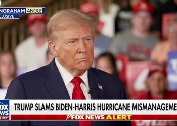 Harris takes slim lead over Trump in new poll as voters view her as candidate of change