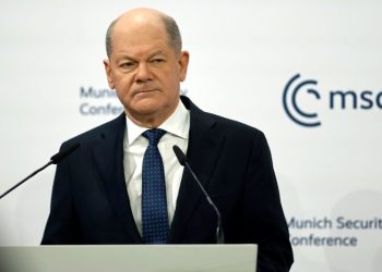 Scholz says Germans will decide their democracy for themselves, hitting back at Vance